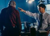 С Лиамом Нисоном на съемках фильма «Человек Тьмы» (1990)